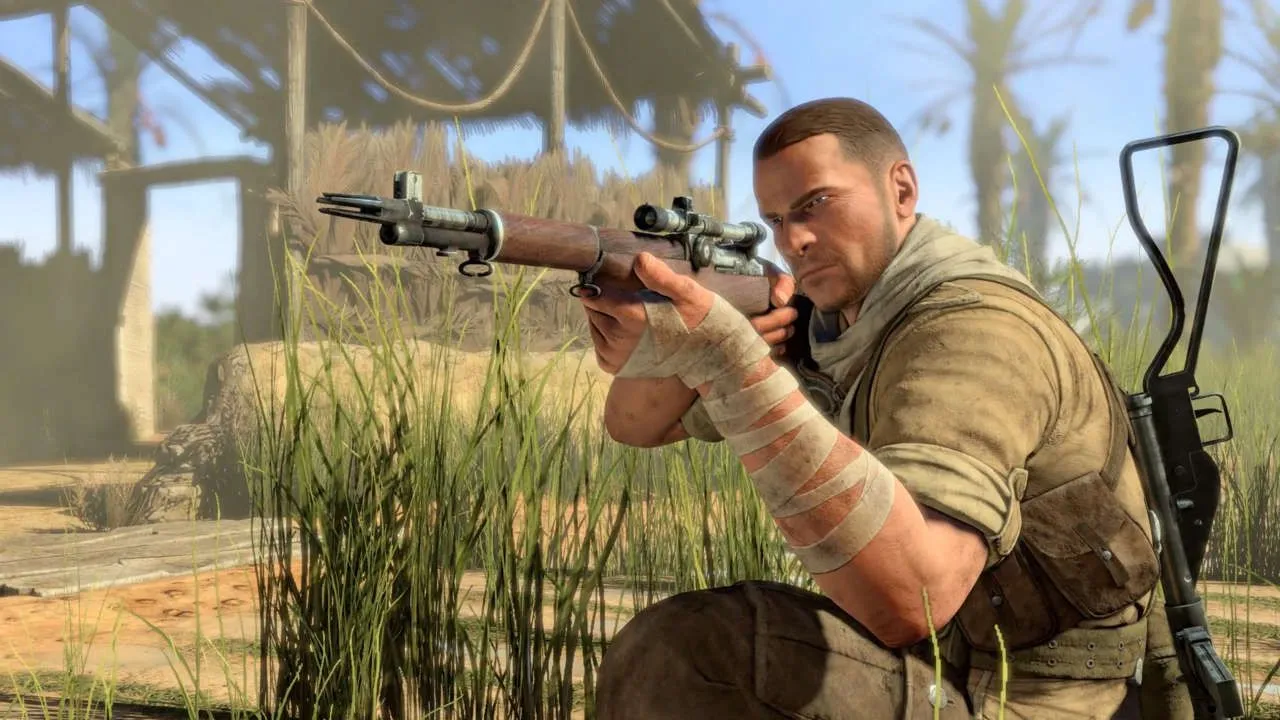 Ảnh chụp màn hình từ trailer Sniper Elite 3 với bối cảnh chiến trường Bắc Phi