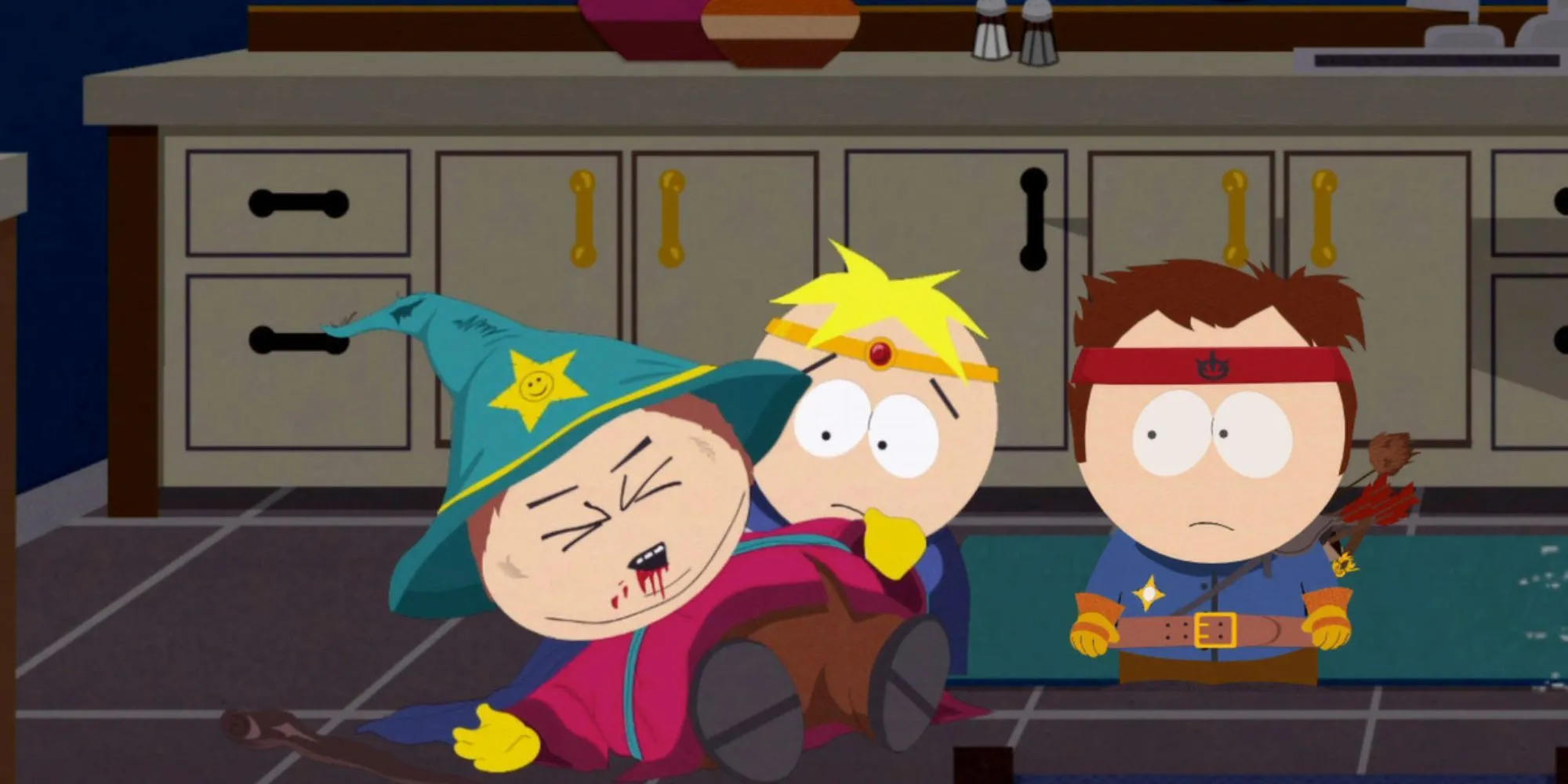 Cảnh trong game South Park The Stick of Truth với Butters, Stan và Cartman bị thương