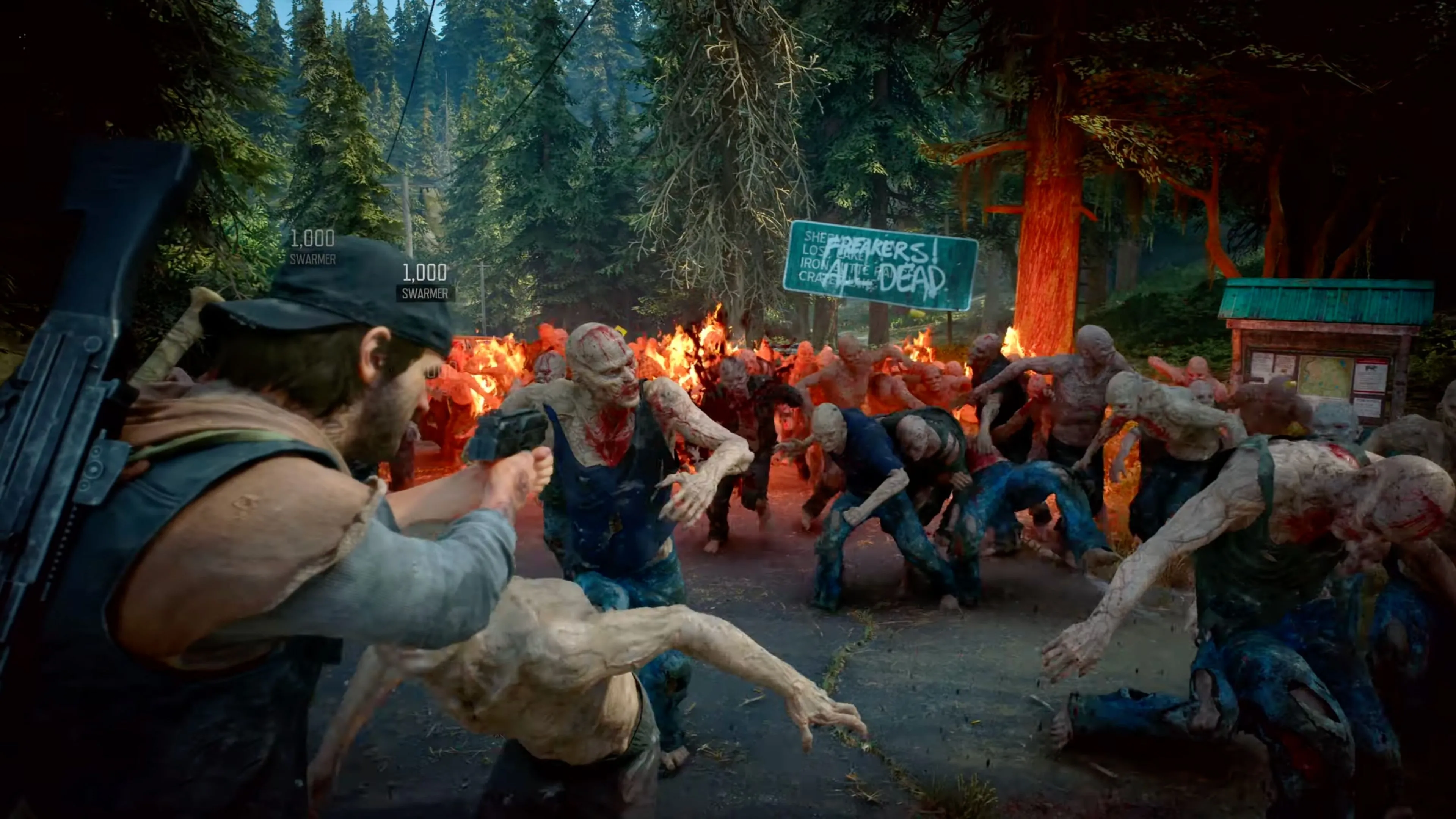 Deacon St. John chiến đấu với bầy Freaker trong Days Gone Remastered