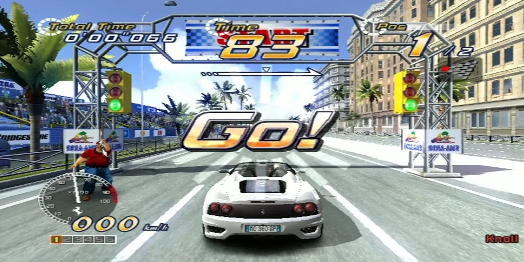 Gameplay của Outrun 2 với chiếc Ferrari đang drift trên đường đua ven biển