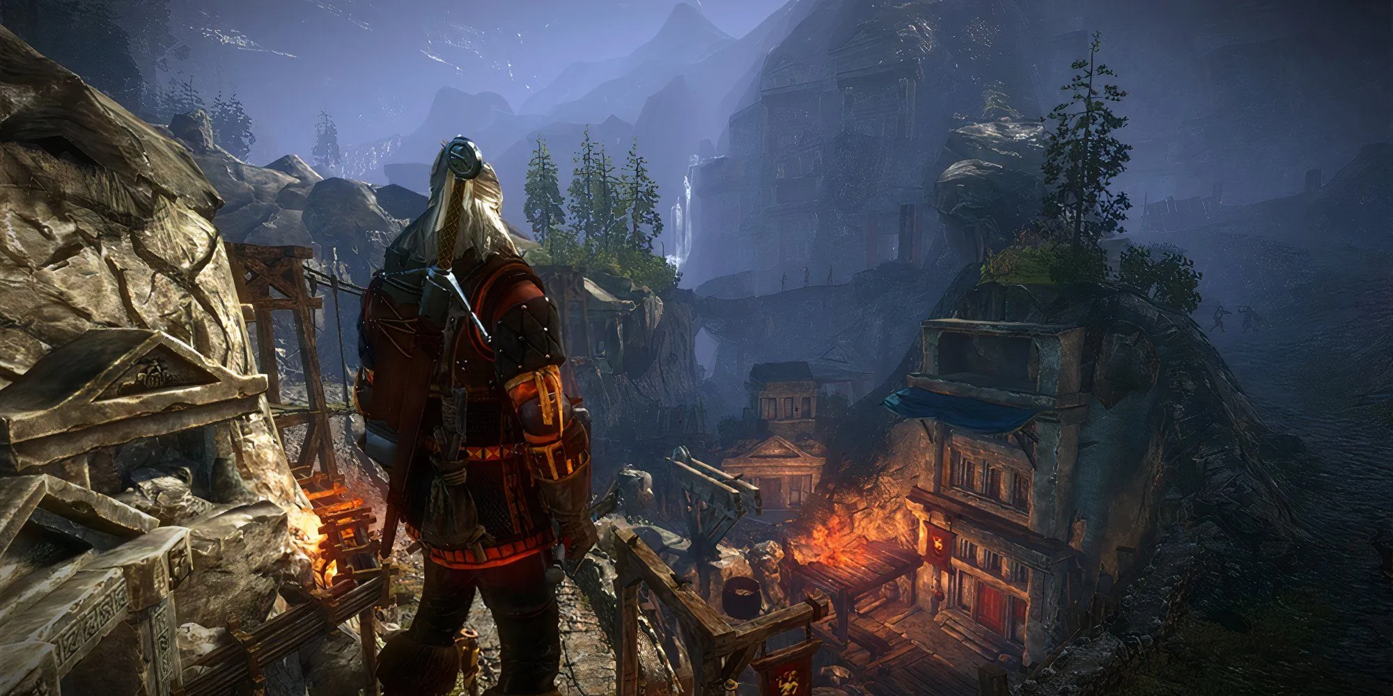 Geralt nhìn xuống một thị trấn trong The Witcher 2