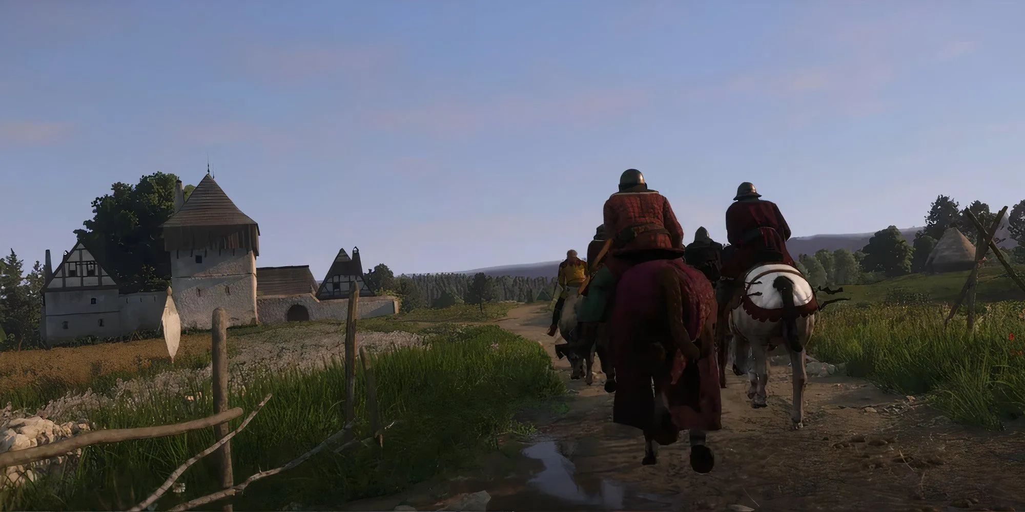 Henry và Hashek cưỡi ngựa đến dinh thự Semine trong Kingdom Come Deliverance 2