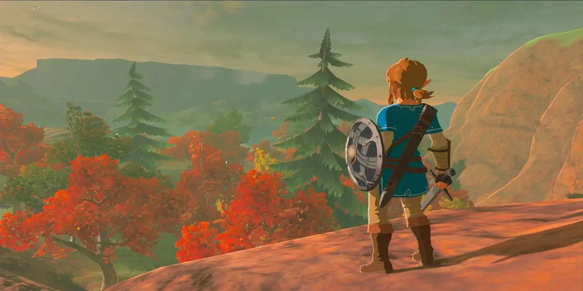Link nhìn ra vách đá trong The Legend of Zelda: Breath of the Wild, khung cảnh rộng lớn của Hyrule