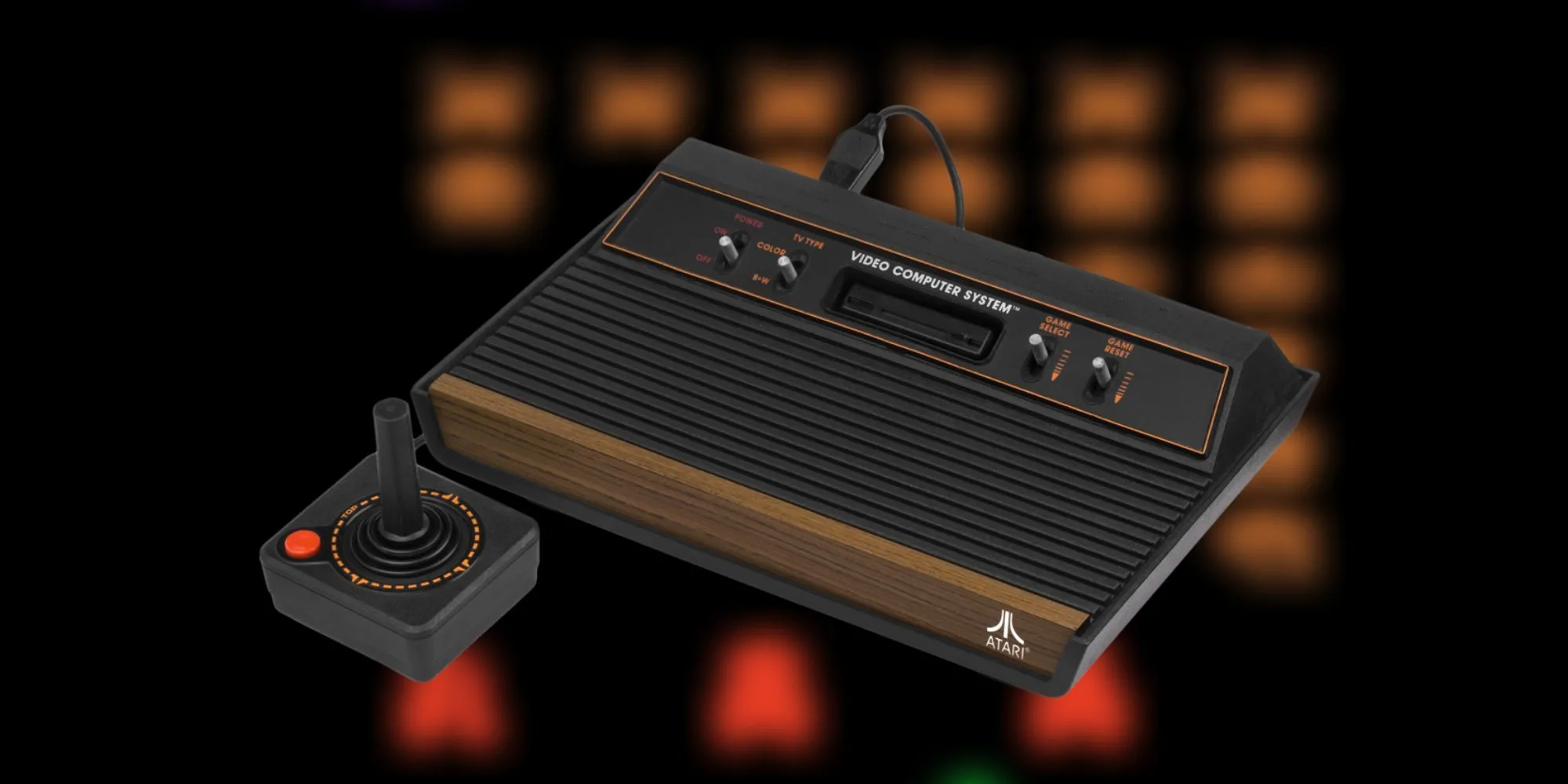 Máy chơi game Atari 2600 cổ điển với tay cầm joystick