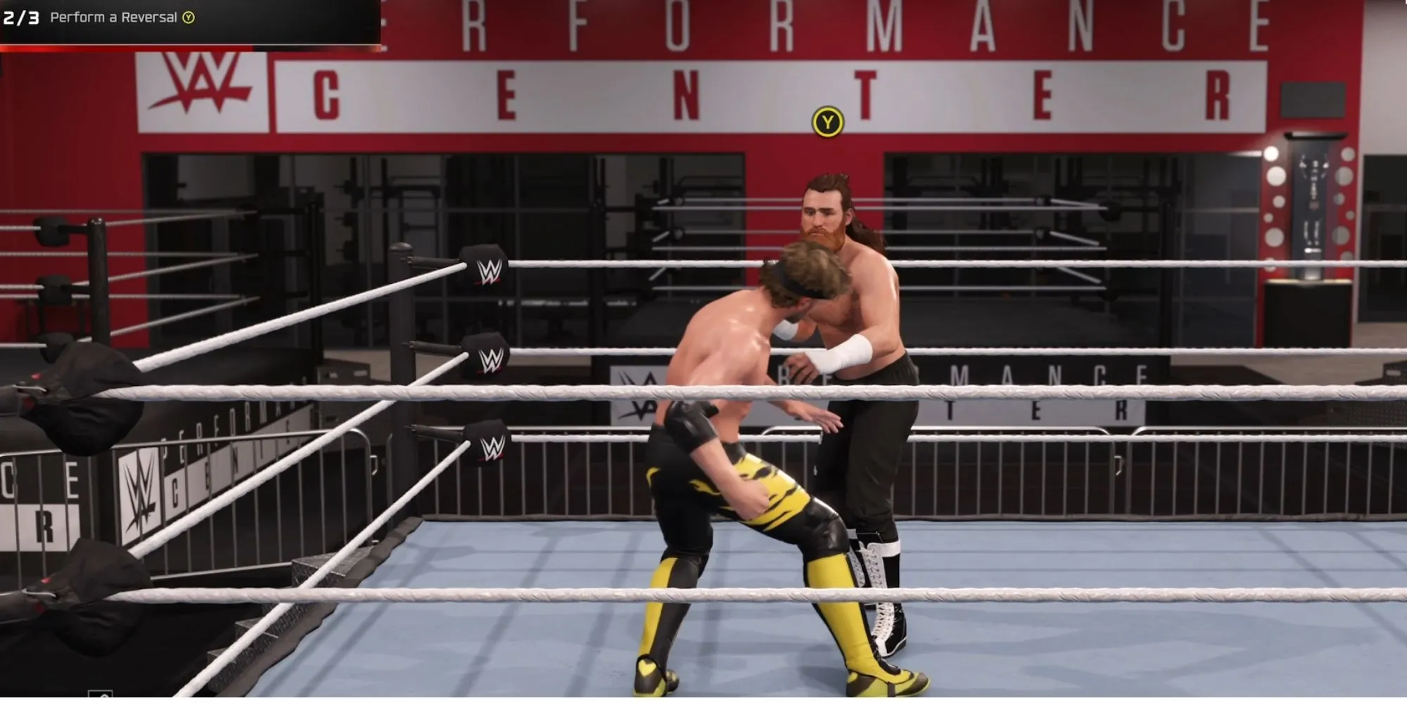 Minh họa một đô vật đang chuẩn bị thực hiện đòn phản công trong game WWE 2K25
