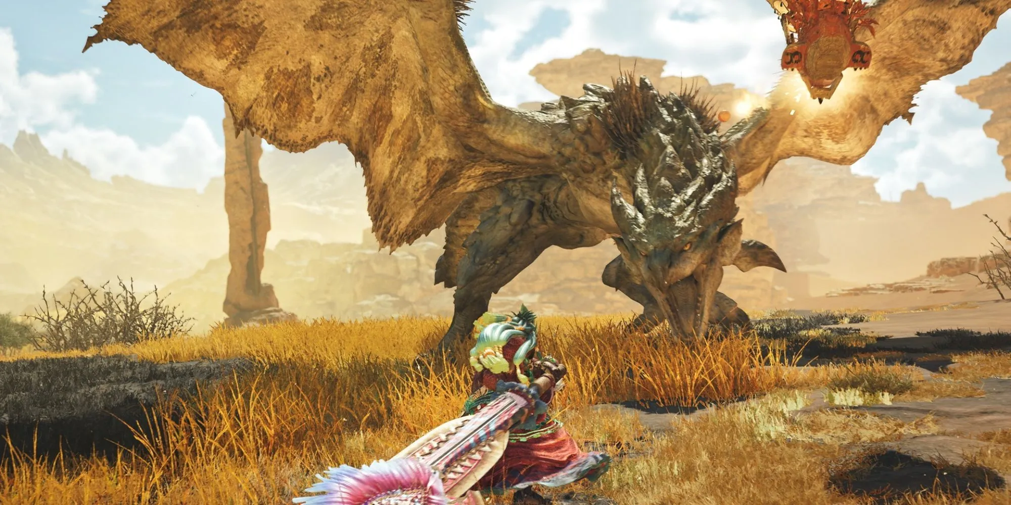 Một nhân vật người chơi trong Monster Hunter Wilds đang chiến đấu với Rathian bằng kiếm lớn trong môi trường sa mạc.