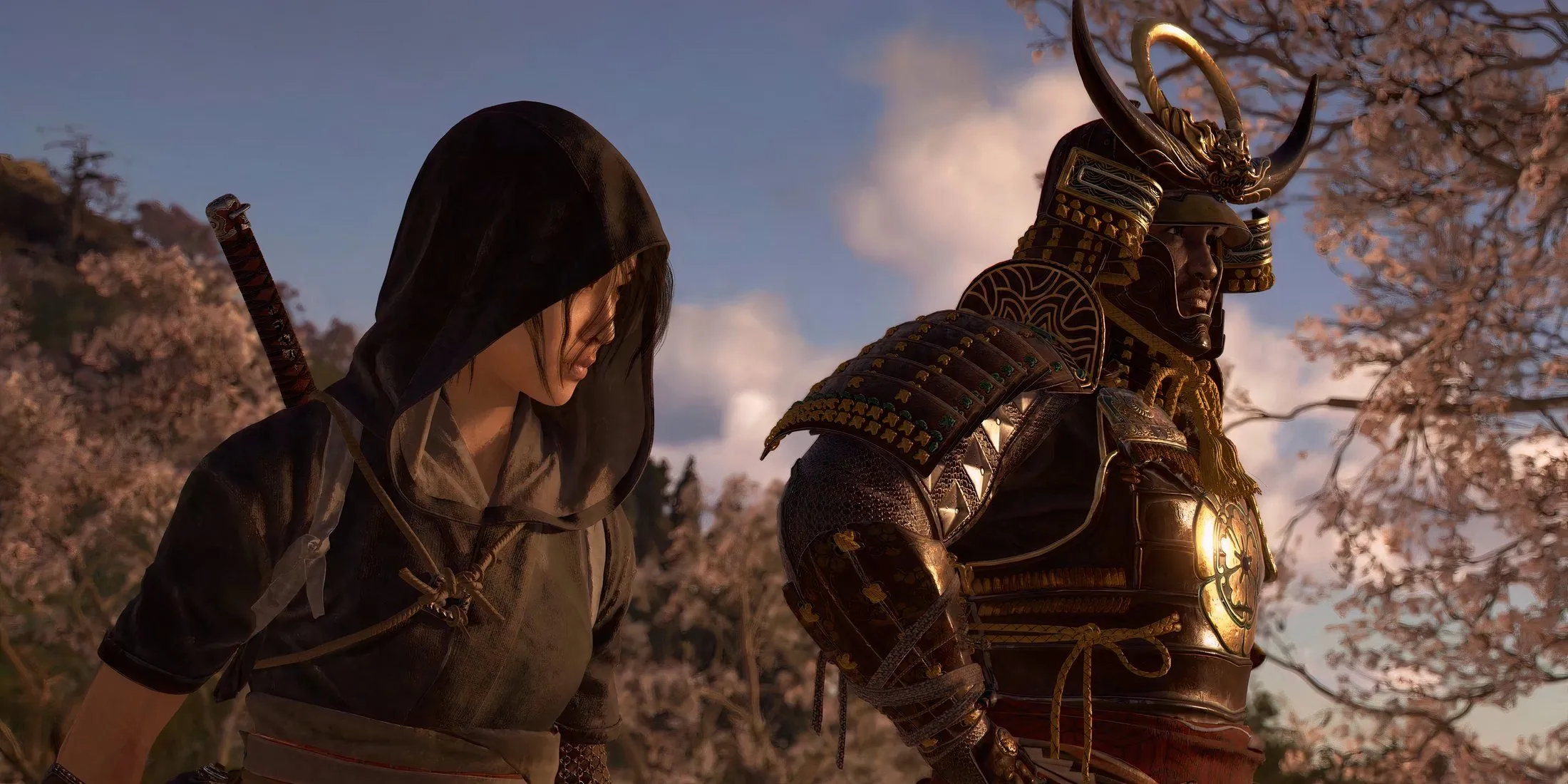 Naoe và Yasuke, hai nhân vật chính trong Assassin's Creed Shadows, đứng cạnh nhau trên nền đồ họa ấn tượng