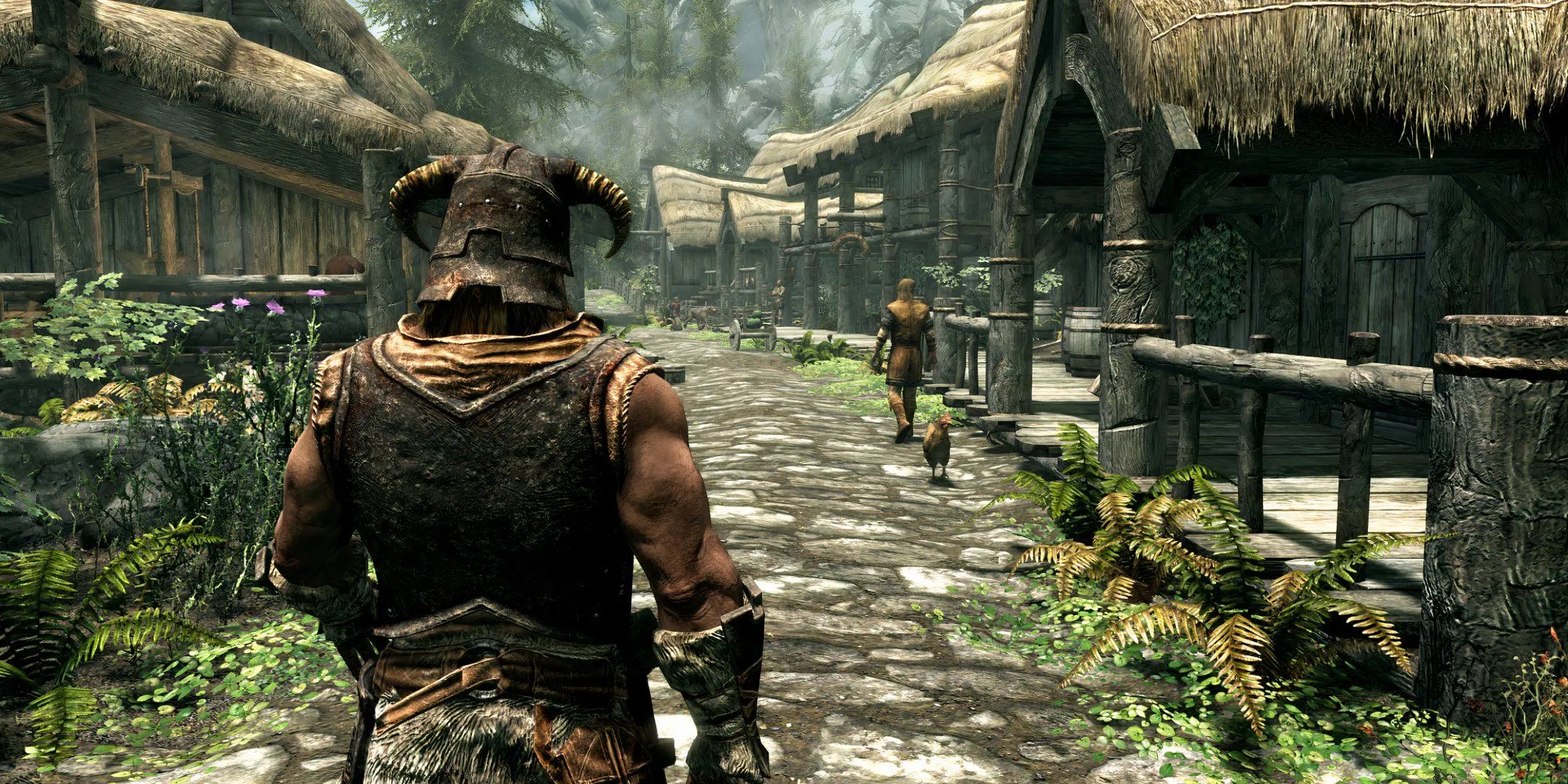 Nhân vật chính trong The Elder Scrolls V: Skyrim nhìn từ phía sau đang khám phá khu dân cư