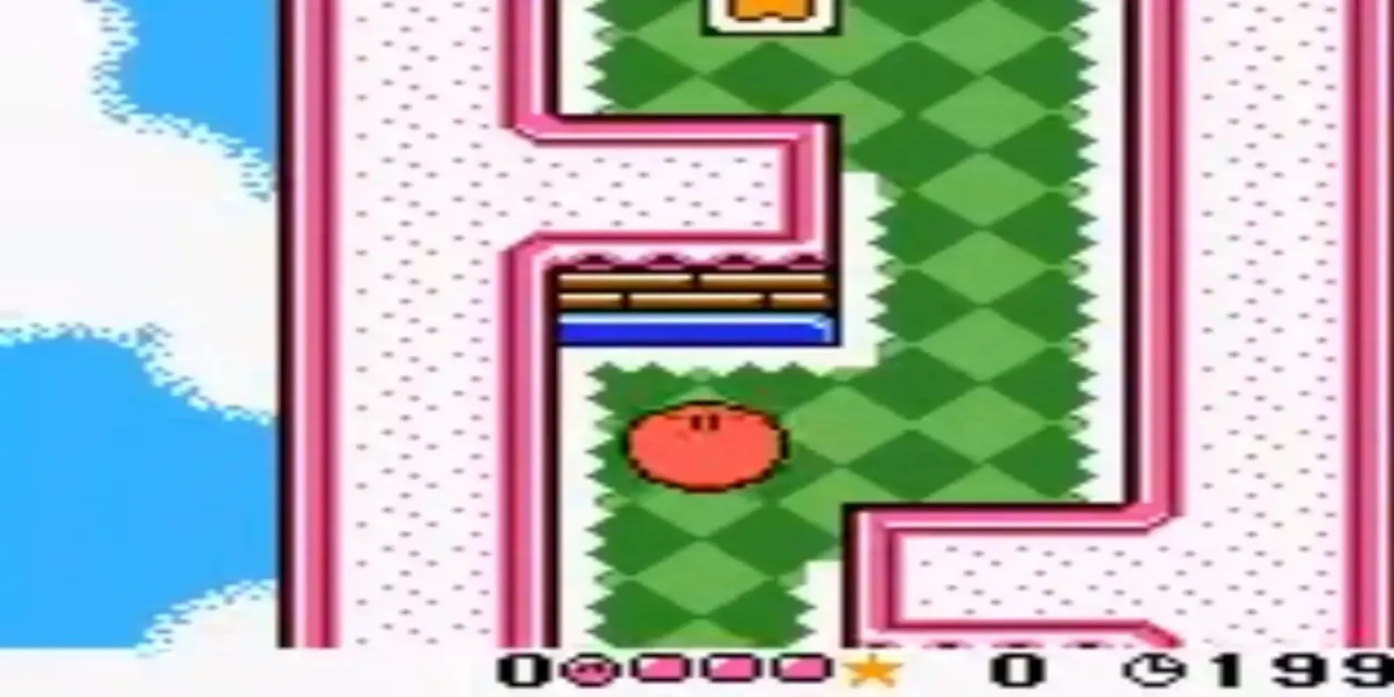 Nhân vật Kirby đang lăn trên màn hình Game Boy Color trong game Kirby Tilt 'n' Tumble