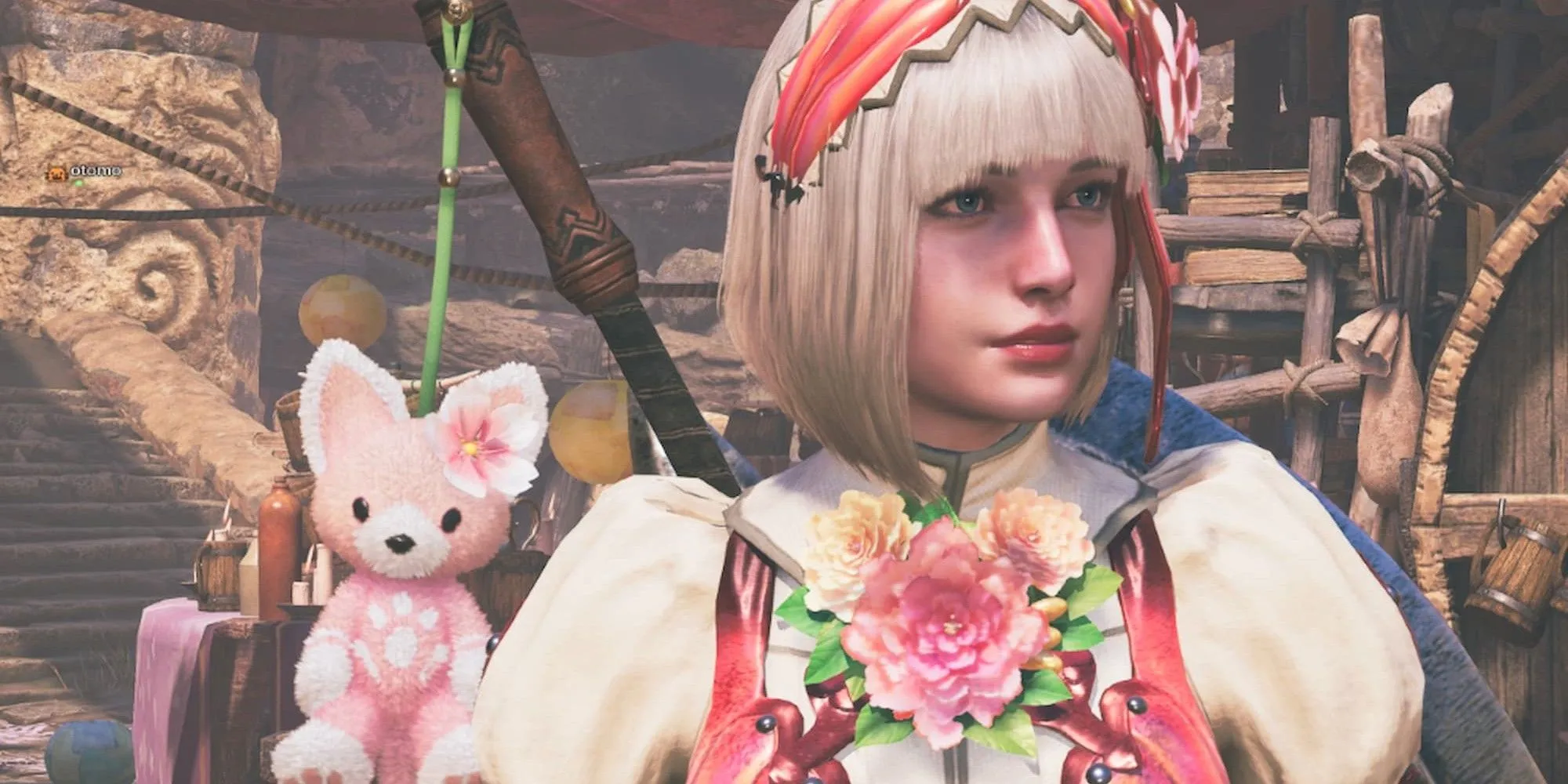 Nhân vật nữ và thú nhồi bông trong Monster Hunter Wilds thể hiện khía cạnh tùy chỉnh và đời sống trong game