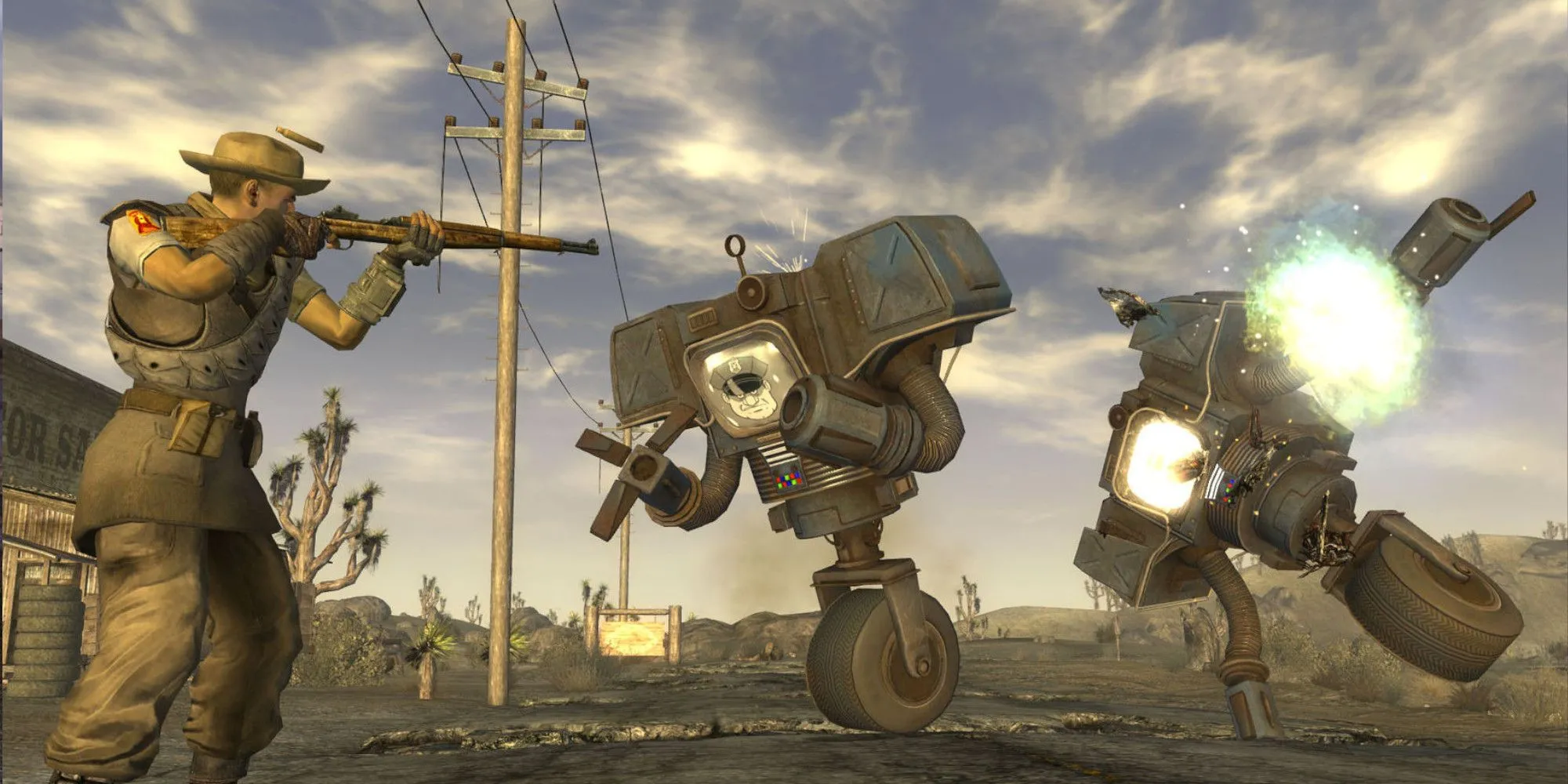 Nhân vật trong Fallout New Vegas chĩa vũ khí vào máy móc