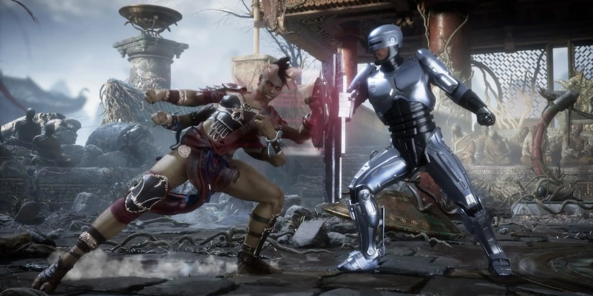 Sheeva và Robocop đối đầu trong Mortal Kombat 11, thể hiện đồ họa chi tiết và bạo lực đặc trưng của series