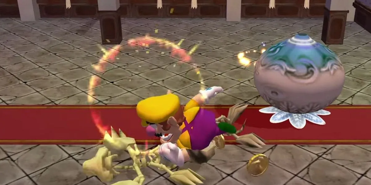 Wario dùng đầu húc một kẻ địch với hiệu ứng hoạt hình trong game Wario World