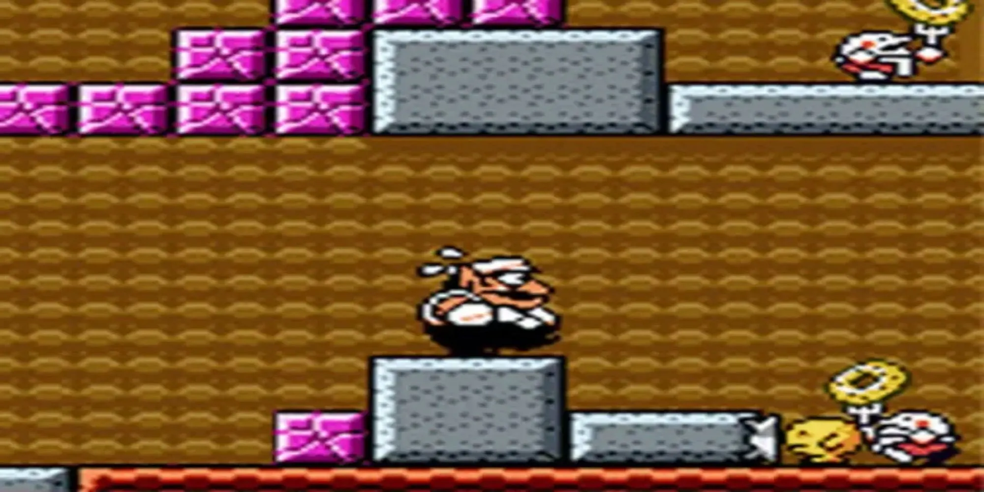 Wario trong một màn chơi của Wario Land 3 trên Game Boy Color