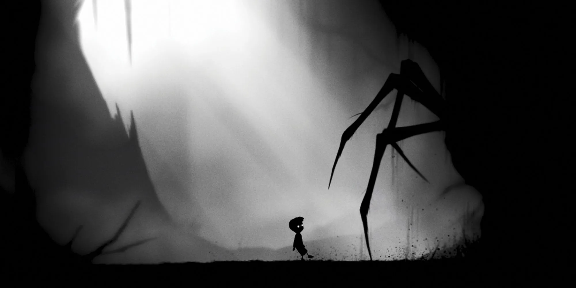 Cậu bé trong Limbo đối mặt với con nhện khổng lồ, một hình ảnh kinh điển của game indie kinh dị