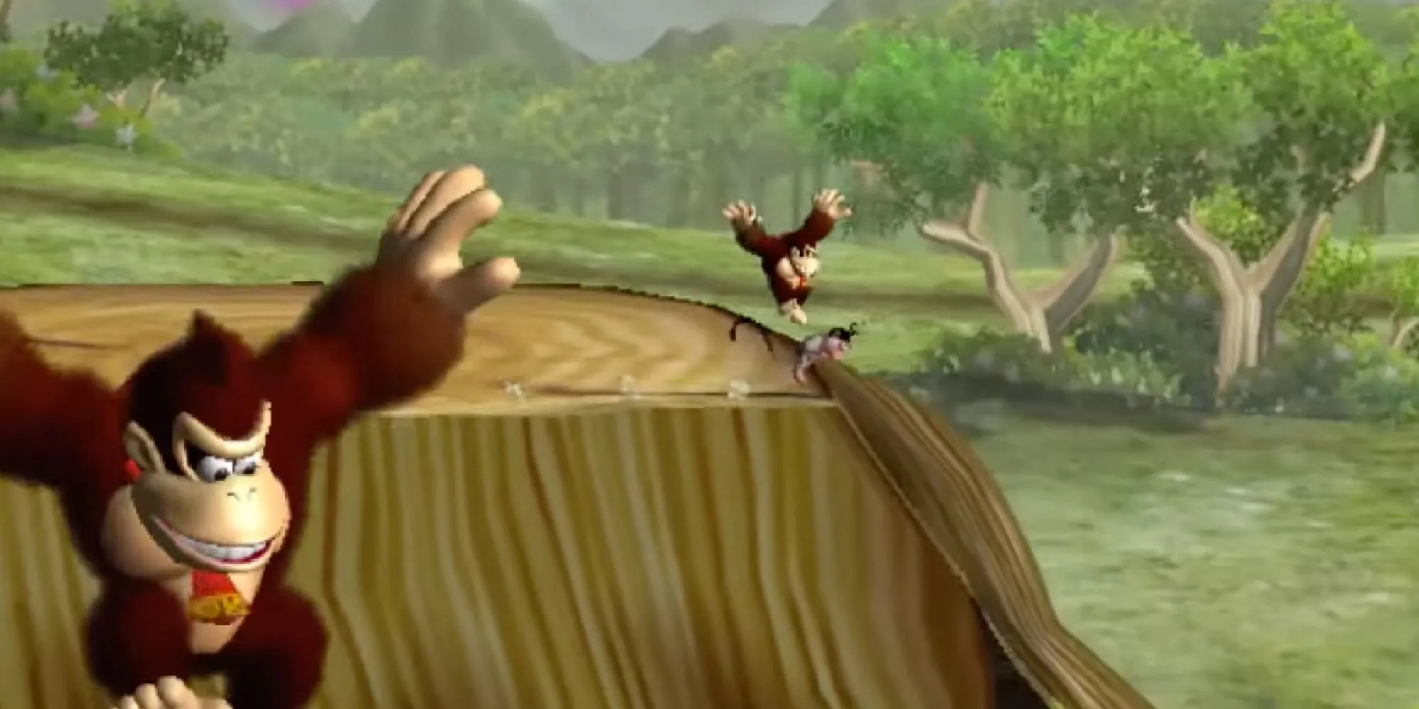 Donkey Kong đang thực hiện cú nhảy đặc trưng trong game Donkey Kong Jungle Beat trên GameCube.