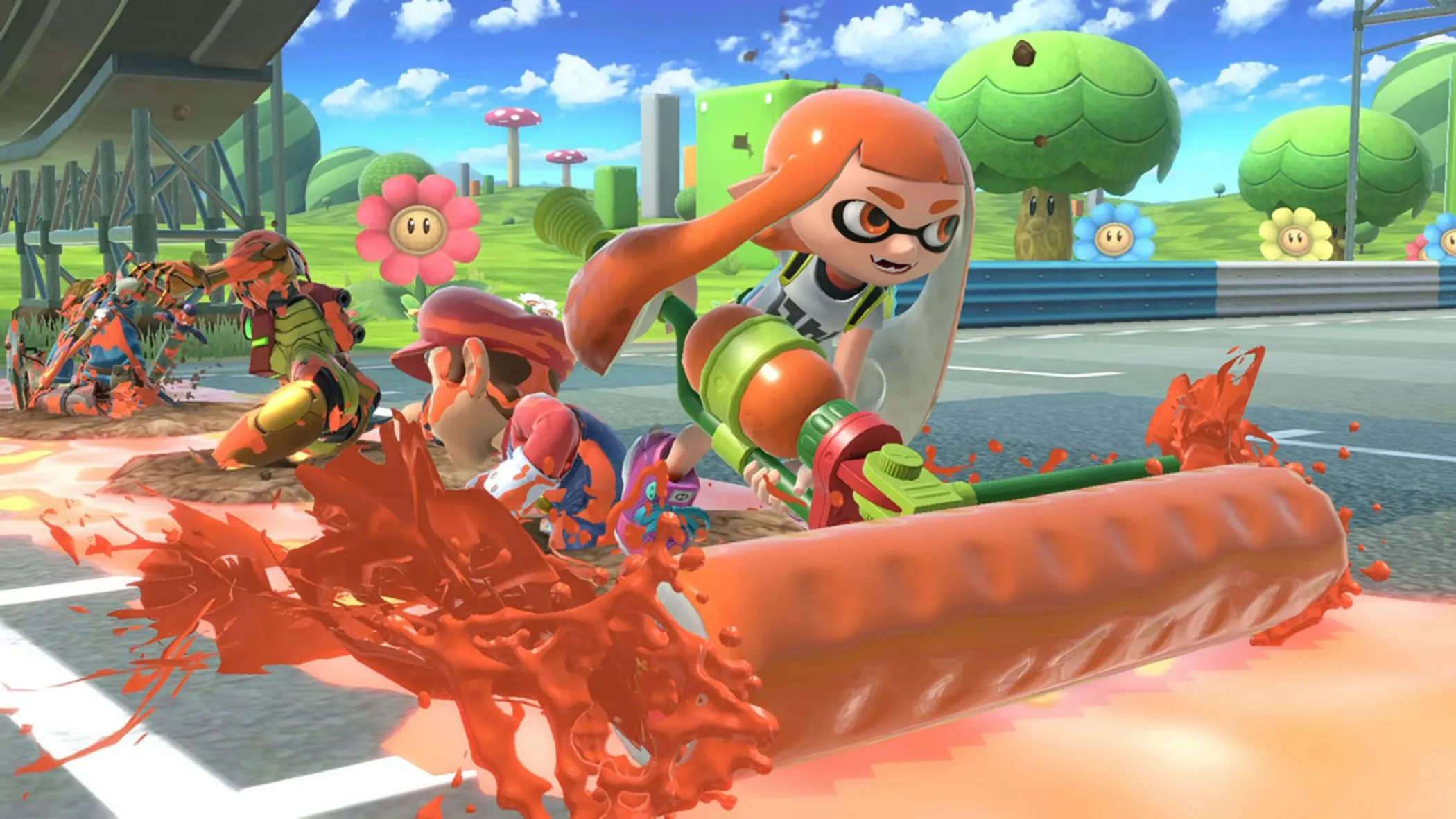 Inkling nữ tung mực cam trên đường đua Mario Kart trong Super Smash Bros. Ultimate