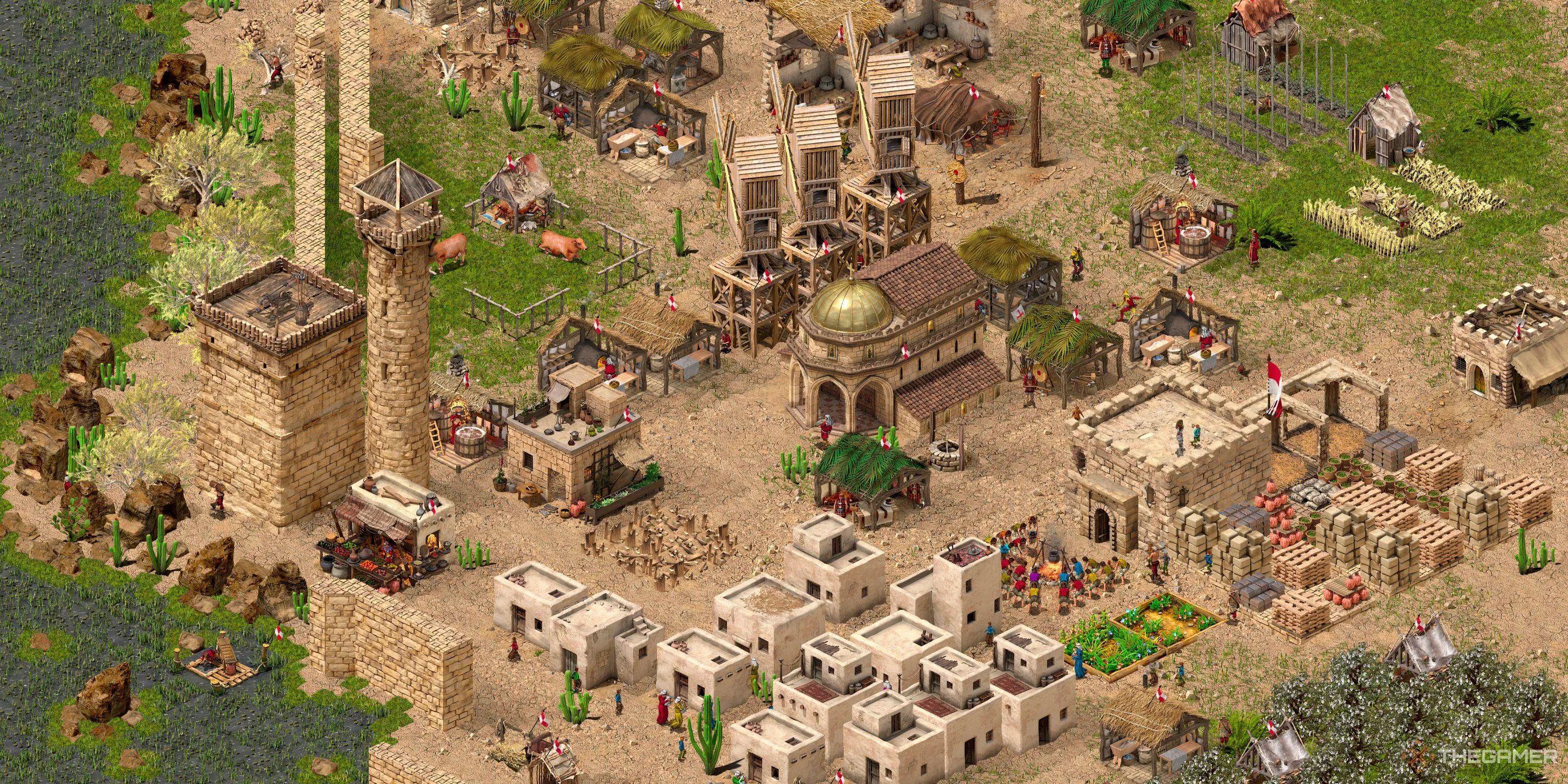 Một khu định cư cấp trung bình của game thủ trong Stronghold Crusader Definitive Edition, thể hiện sự phát triển từ giai đoạn đầu đến giữa trận, chuẩn bị cho phòng thủ vững chắc.