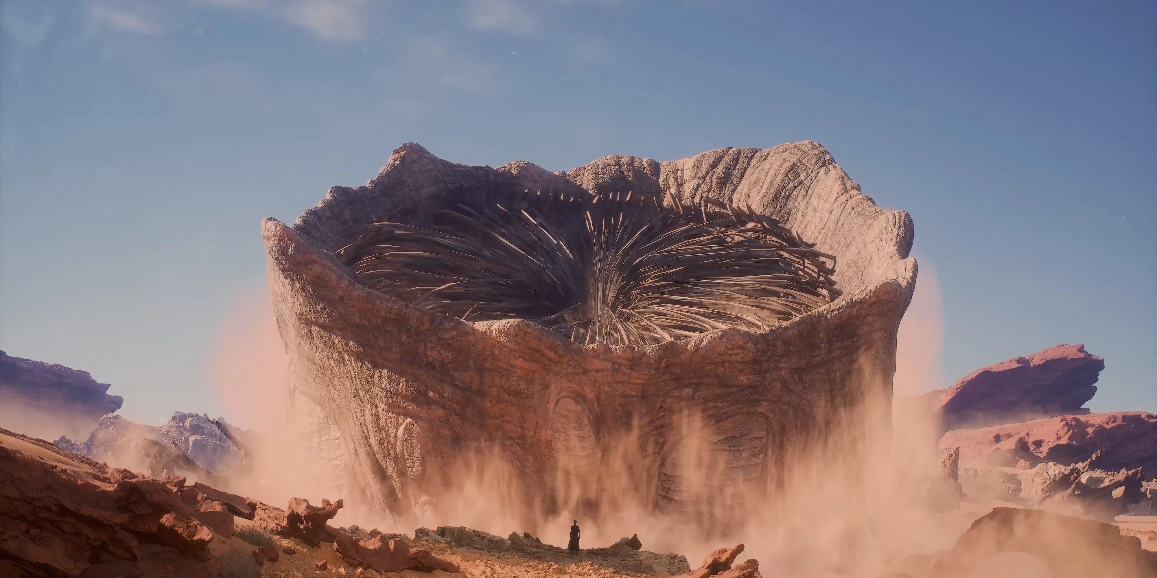 Người chơi đứng đối mặt với Giun Cát khổng lồ trồi lên từ cát trong Dune Awakening