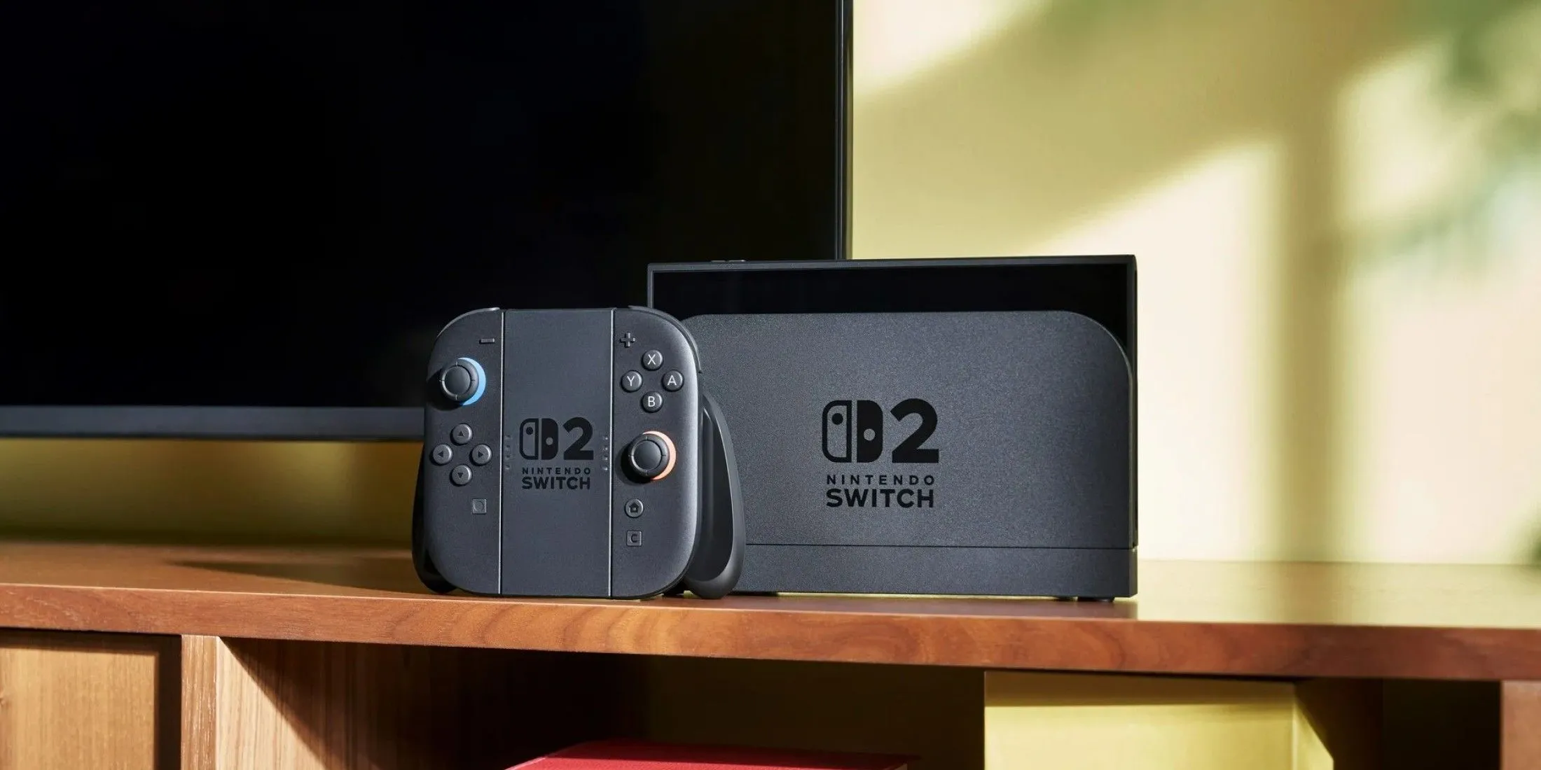 Nintendo Switch 2 trên kệ TV ở chế độ dock